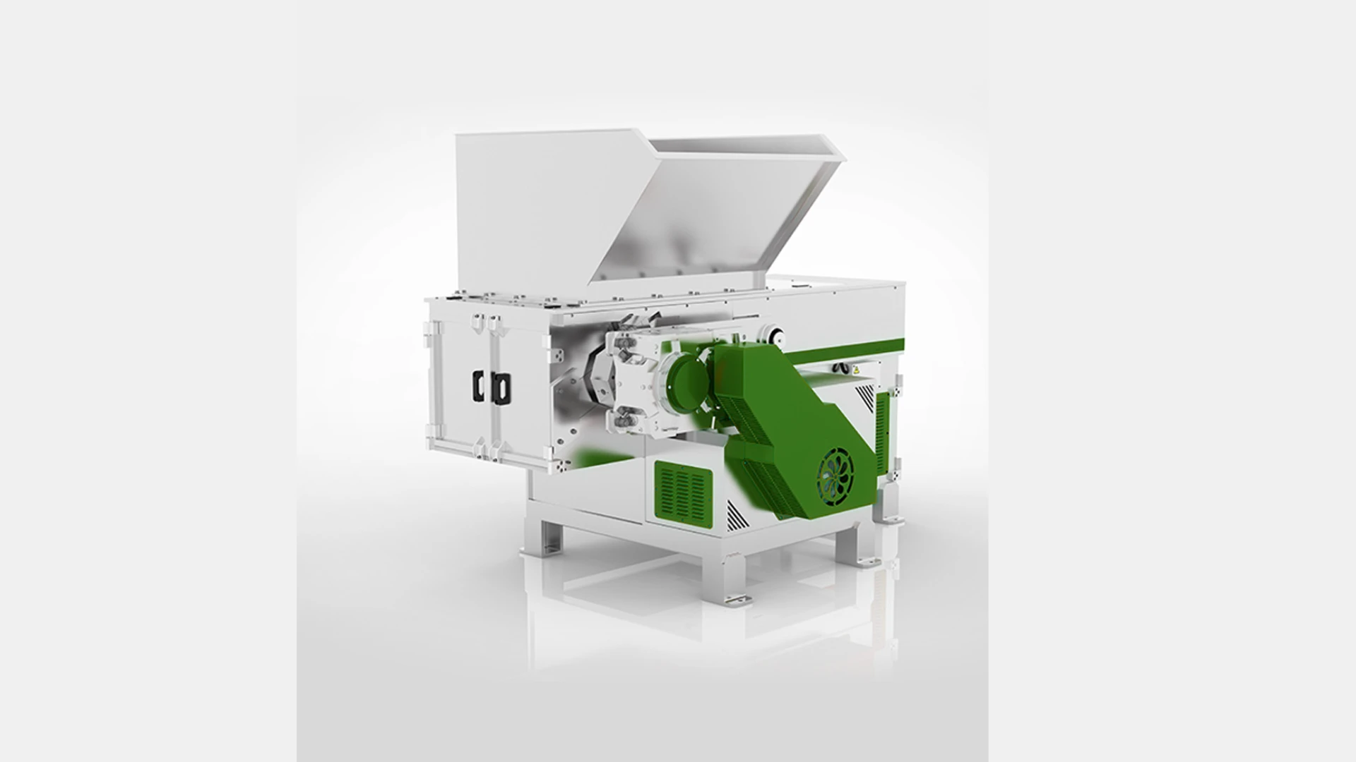 A high-quality industrial shredder designed for efficient material processing. The shredder features a robust white and green construction with a large feed hopper for easy loading of materials. The machine includes a powerful motor and a strong cutting mechanism, housed in a sturdy frame with accessible maintenance doors. This shredder is ideal for industrial applications such as recycling and waste management, offering high performance and reliability in handling various types of materials.