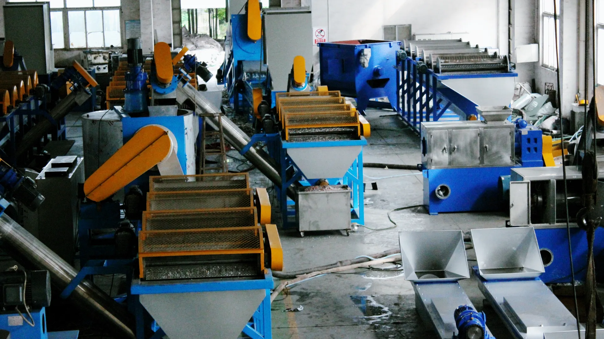 Busy industrial recycling facility machinery