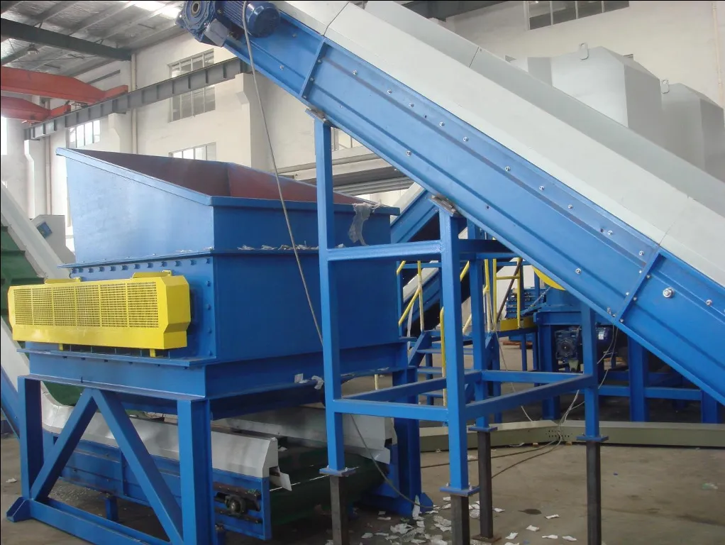 Industrial blue paper recycling conveyor system in factory