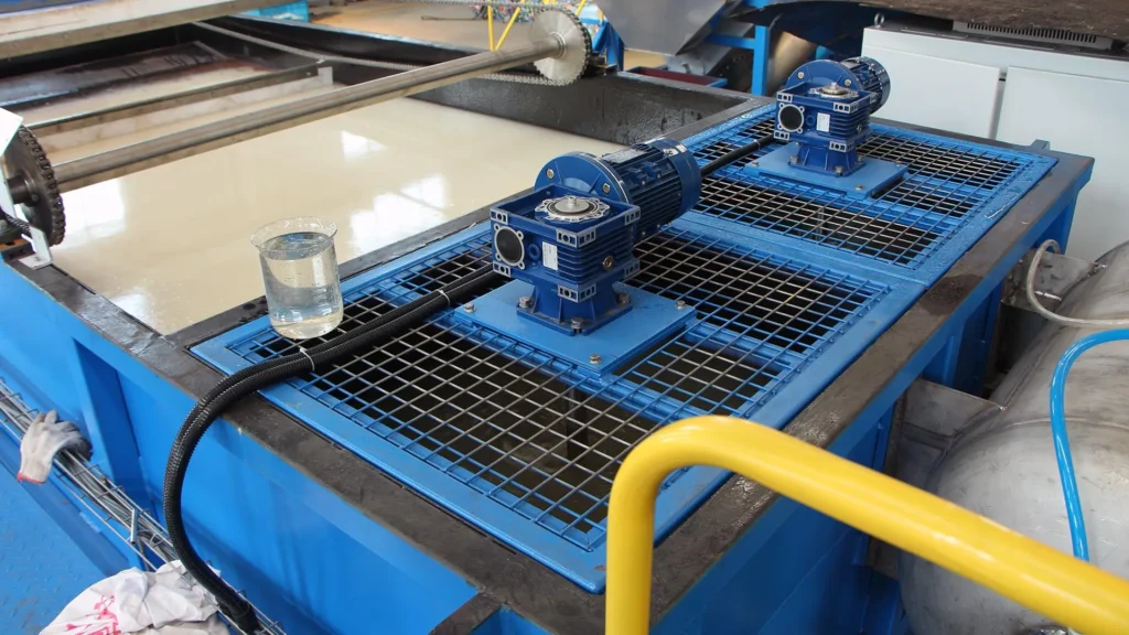 Industrial water pumps on blue machinery platform