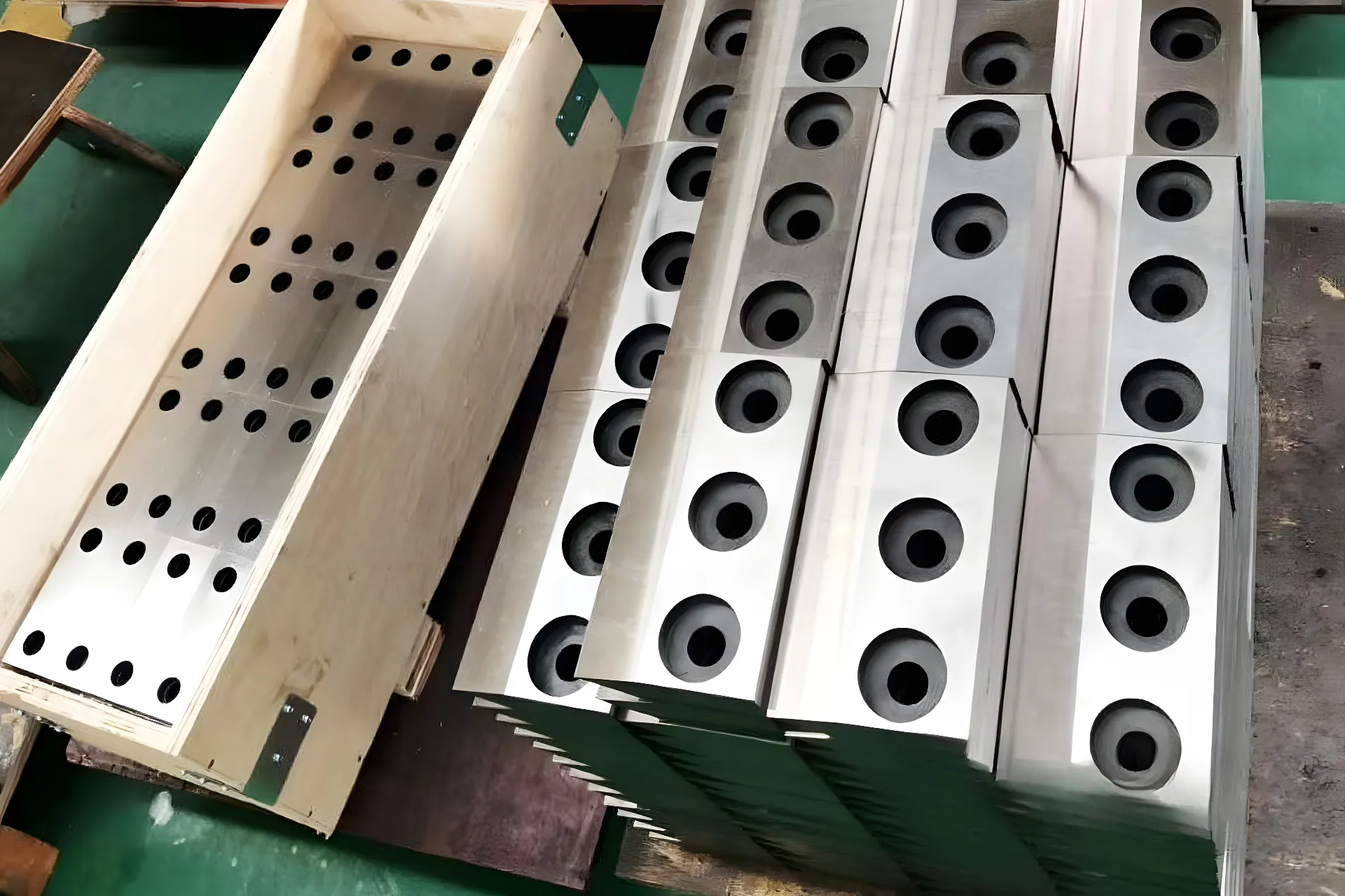 Stack of metal blocks with holes