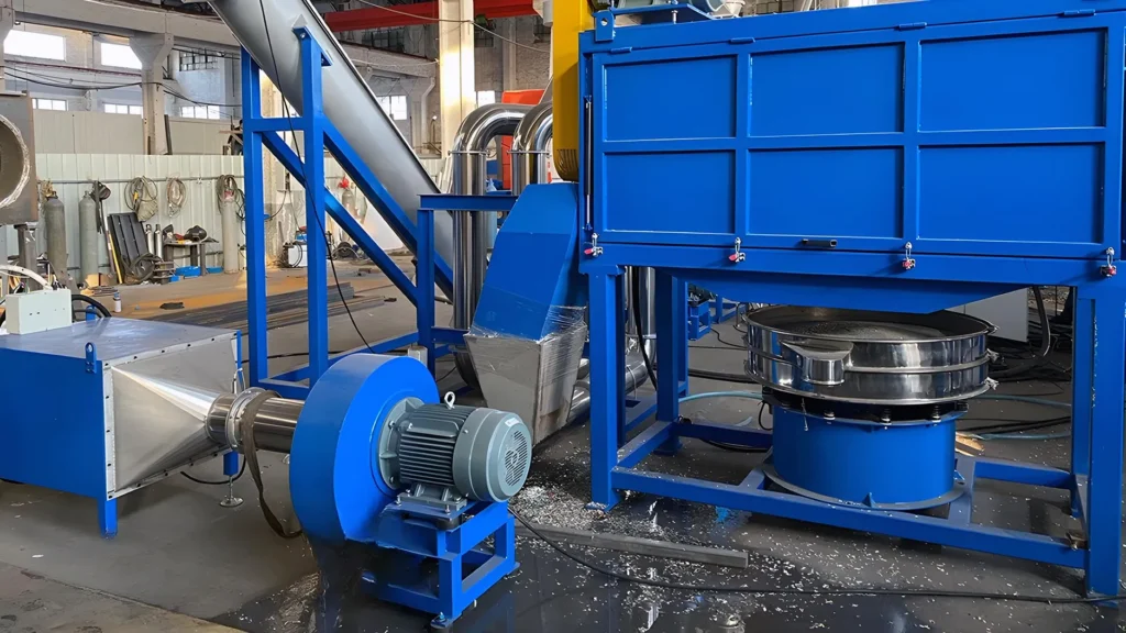 Industrial blue recycling machinery in factory setting