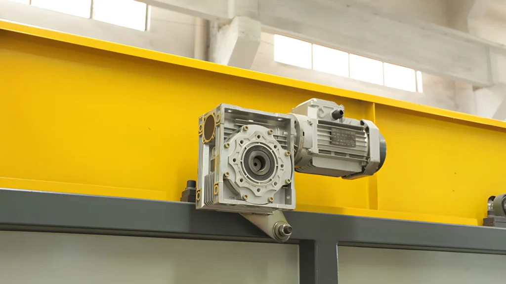 Industrial motor mounted on yellow factory wall